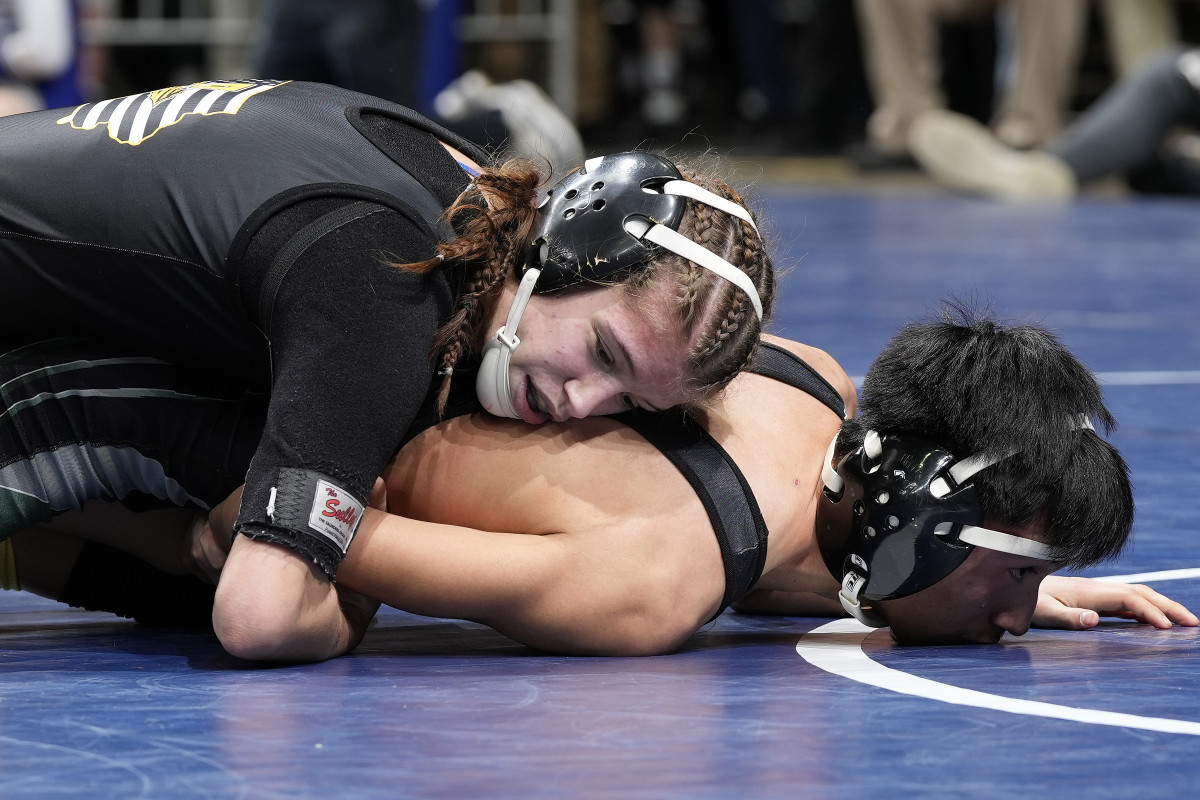 Reanah Utterback elected to wrestle with the boys instead of newly sanctioned IGHSAU girls wrestling.